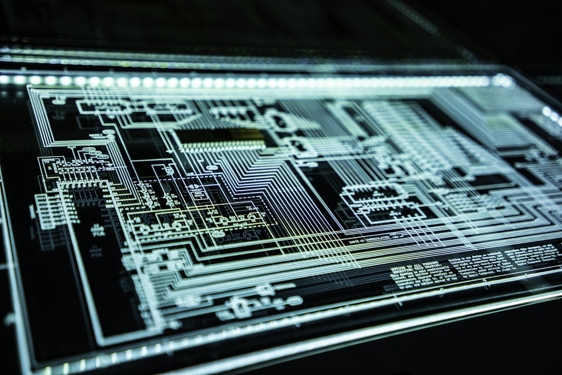 Close-up of illuminated circuit board with electronic components