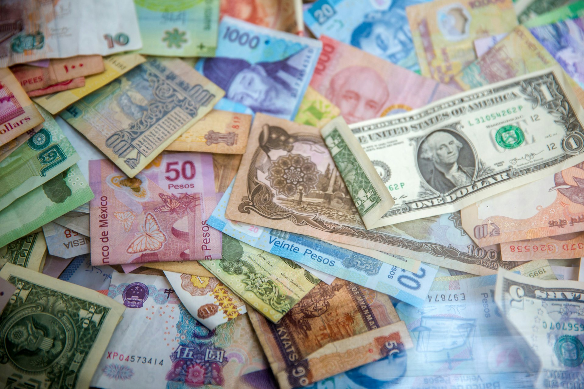 Assorted international currency banknotes from multiple countries
