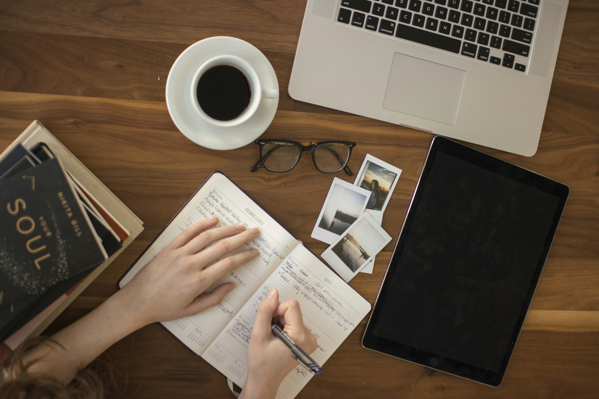 Travel planning with laptop and map